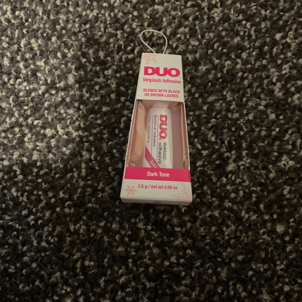 Dup striplash adhesive dark tone 2.5